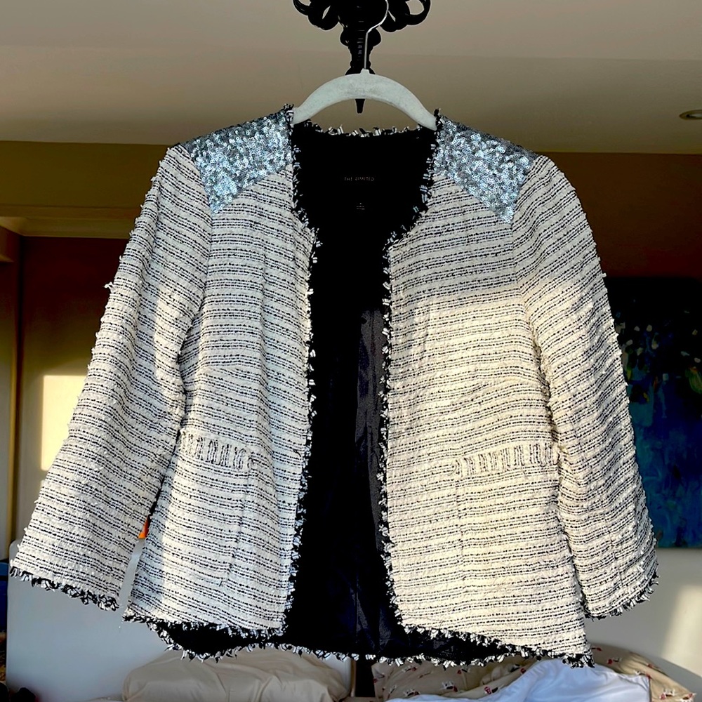 The limited White/Black w/silver accents 3/4 sleeve jacket